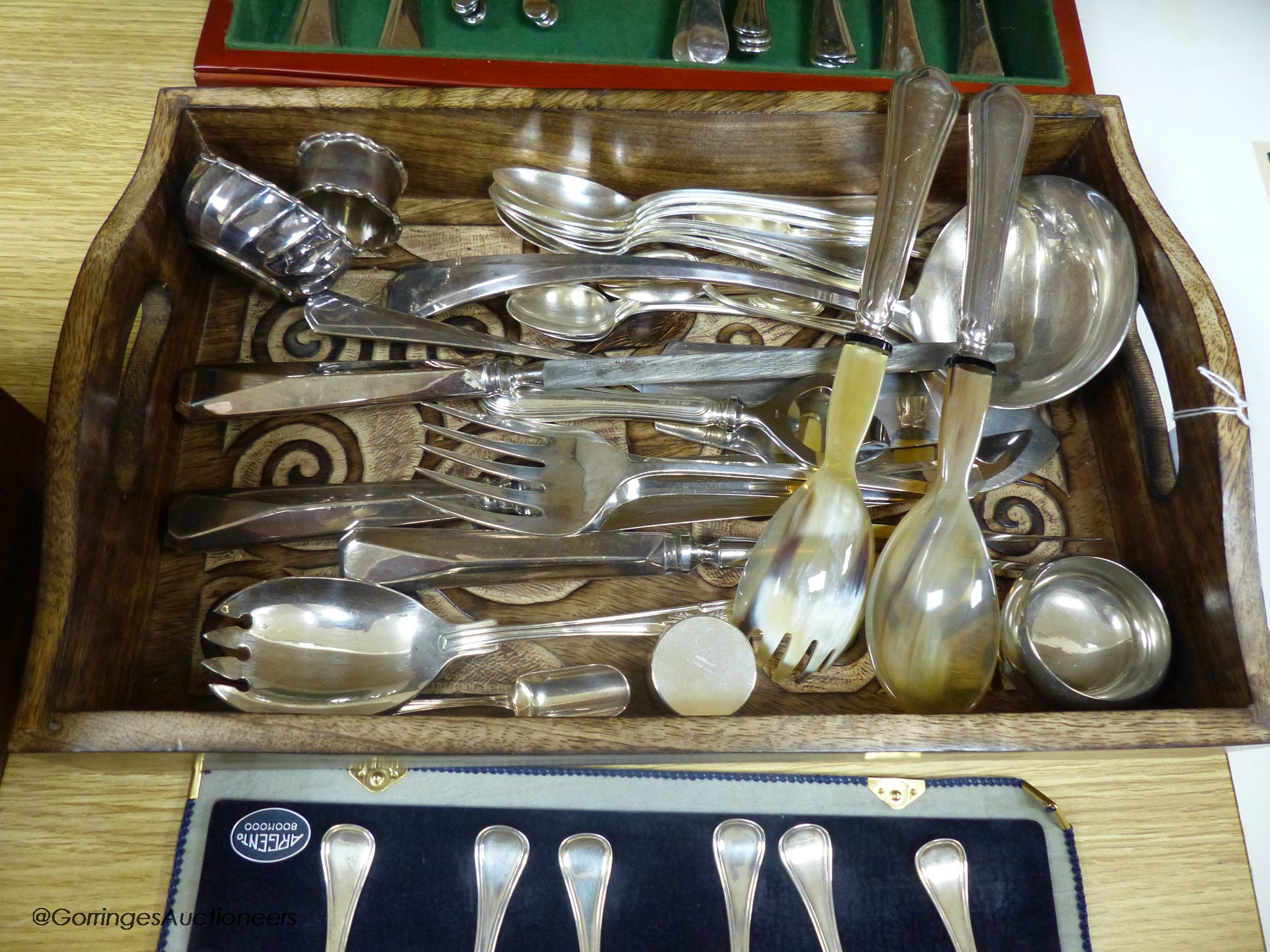 Five Italian 800 standard tea spoons, and six dessert spoons, a silver napkin ring, an 800 standard pill box and a quantity of plated cutlery.